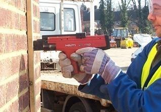 Pistola de precinto sem fio com accionamento a pó de grau profissional DX-450 com fonte de alimentação manual